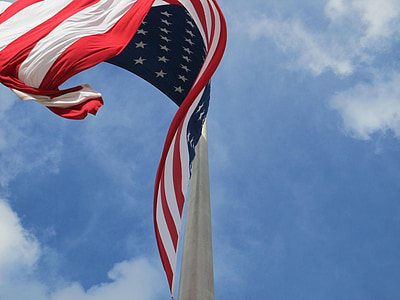 U.S.A. flag under blue sky at daytime thumbnail