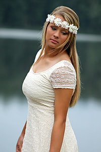 woman wearing white lace scoop-neck dress with white floral crown thumbnail