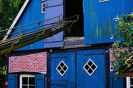 blue wooden shed thumbnail