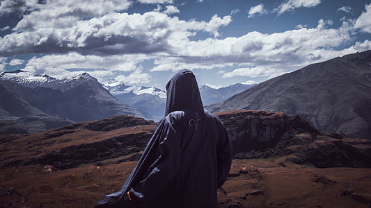 portrait photography of person near mountain thumbnail