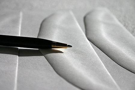 black pen on gray surface thumbnail