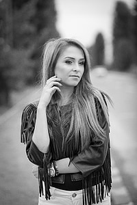 grayscale photography of woman in fringe top thumbnail