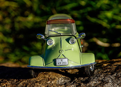 green coupe die-cast model toy photograph thumbnail