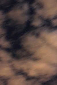dark sky with stars and white clouds thumbnail