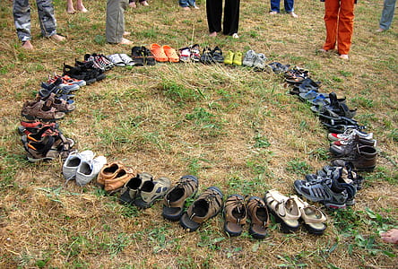 assorted footwear lot on field thumbnail