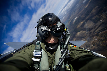 pilot in plane while taking selfie thumbnail