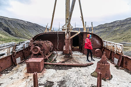 Person Standing on Abandoned Ship thumbnail