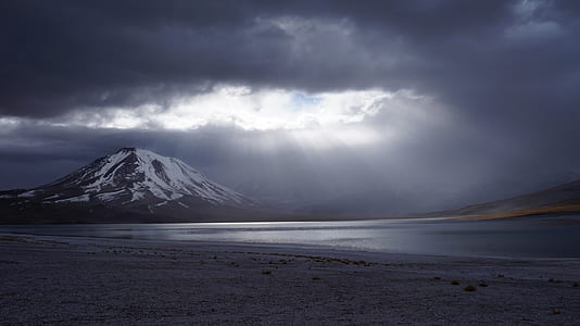 mountain under cloudy gray sky thumbnail