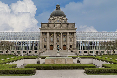 gray and white dome palace near fountain thumbnail