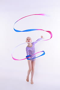 female ribbon gymnast holding ribbon thumbnail