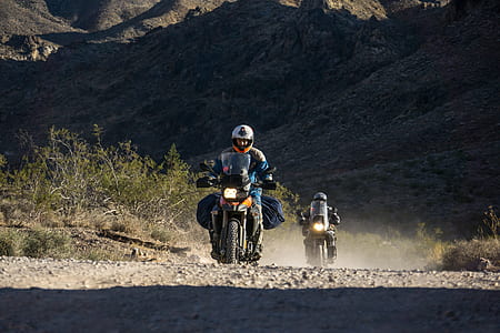 man riding motorcycle on road thumbnail