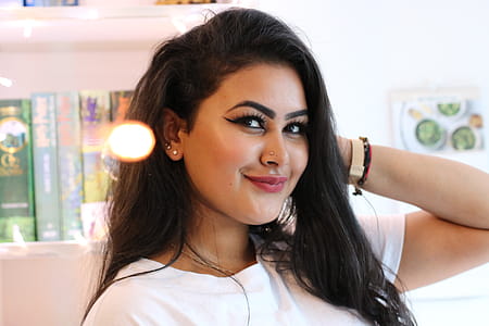 Woman in White Top Inside the House thumbnail