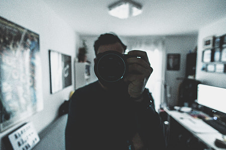 man holding DSLR camera 360 photography thumbnail