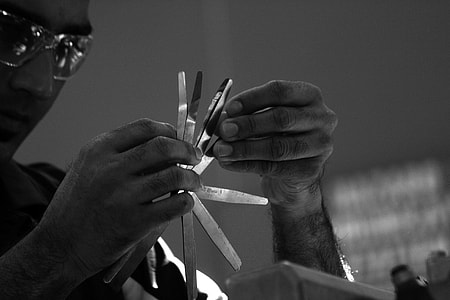person holding cutting tool thumbnail