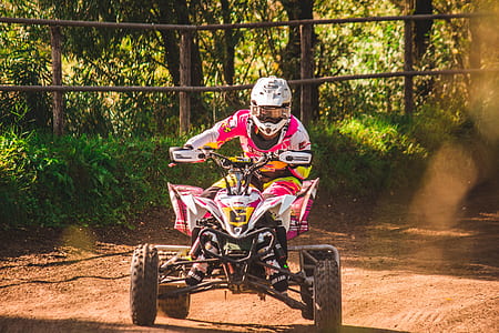 person riding ATV on racetrack thumbnail