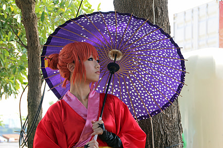 woman in red kimono holding purple umbrella thumbnail