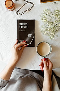 Woman read book and drink coffee thumbnail