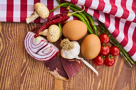 flat lay photography of vegetables and two eggs thumbnail