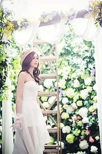 photo of woman wearing dress near brown ladder thumbnail
