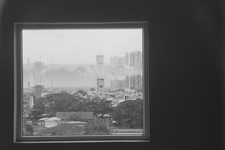 greyscale photography of city photo thumbnail