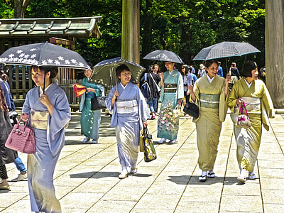 japanese people walking on street thumbnail