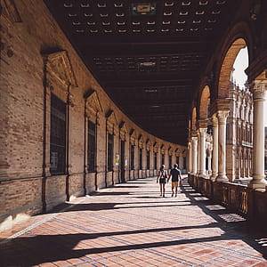Man And Woman Walking On Hallway thumbnail