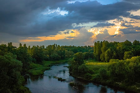 Photo of River Between Green Grass Fields thumbnail