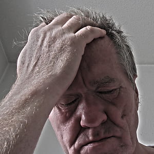 man holding forehead thumbnail