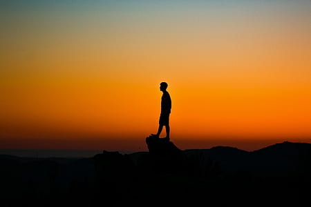 silhouette of man cliff thumbnail