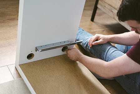 Photo of Man Assembling Furniture thumbnail