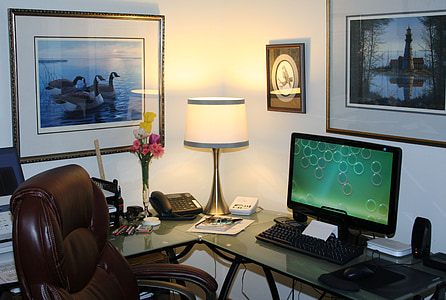 flat screen computer monitor with keyboard and table thumbnail