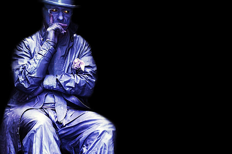 close-up photo of man sitting thinking position thumbnail