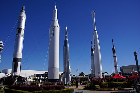 people standing near missiles during daytime thumbnail