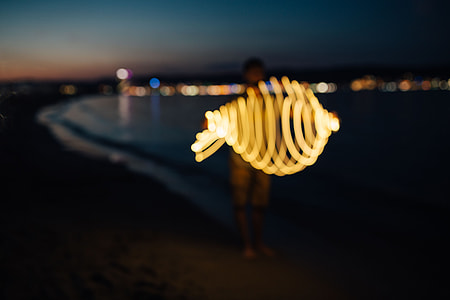 Light painting on the beach at nigh thumbnail