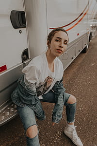 woman sitting on RV step sidebar thumbnail