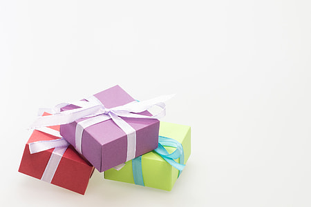 three red, purple and green gift boxes thumbnail