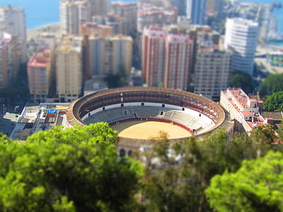 tilt shift photography of brown arena thumbnail