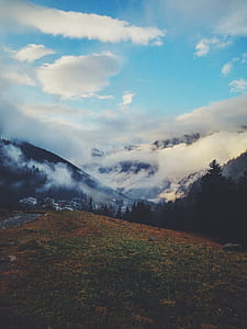 mountains with clouds during daytime thumbnail