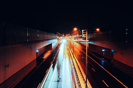 aerial photography of asphalt road during nighttime thumbnail