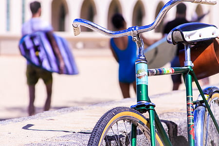 Selective Focus Photography of Green Bike thumbnail