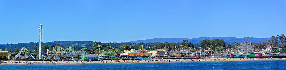 landscape photo of island besides body of water at daytime thumbnail
