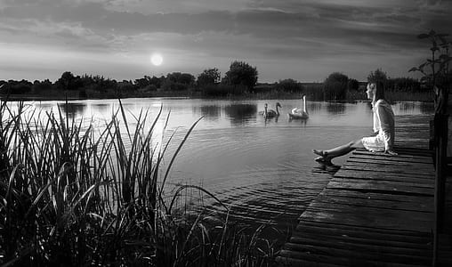 woman sitting on dock thumbnail