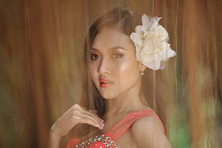 woman wearing pink sleeveless dress thumbnail