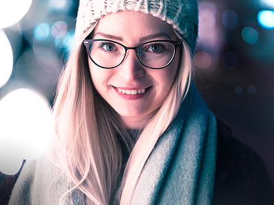woman wearing black framed eyeglasses smiling thumbnail