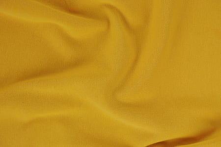 close up photo of yellow cloth thumbnail