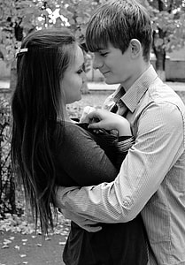 grayscale photography of man and woman thumbnail