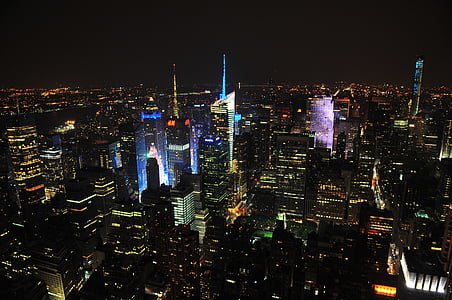 photo of city buildings at nighttime thumbnail
