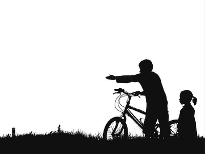 silhouette of man and girl near bike thumbnail