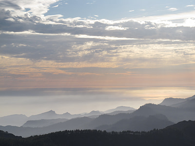 bird's eye photography of mountains covered with fog thumbnail