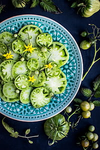 green sliced eggplant on blue ceramic plate thumbnail